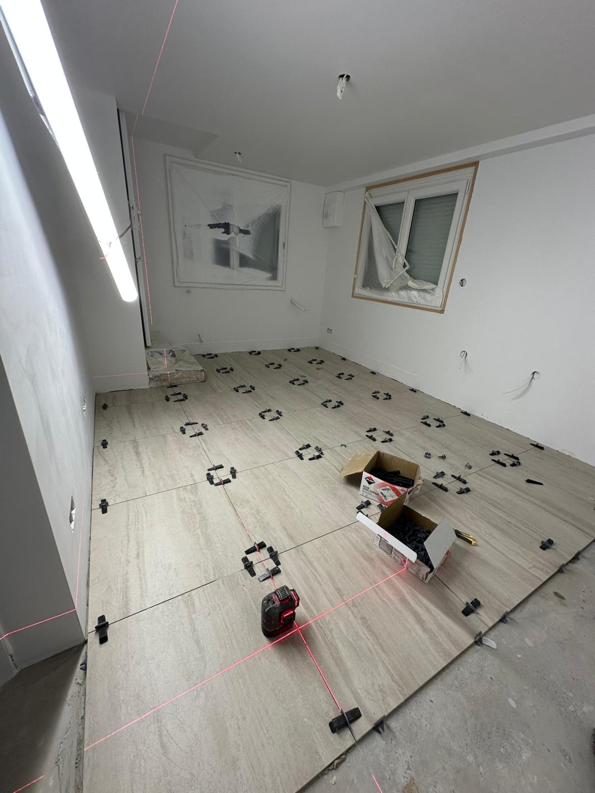 Pose carrelage grand format au laser